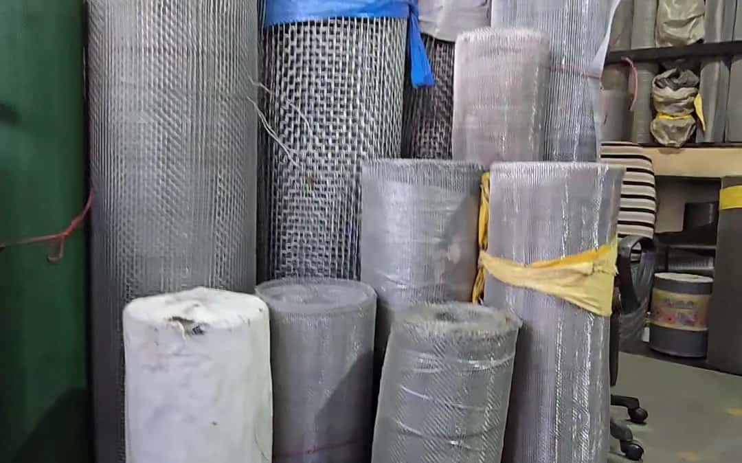 Rolls of steel and fibreglass mosquito net of different widths