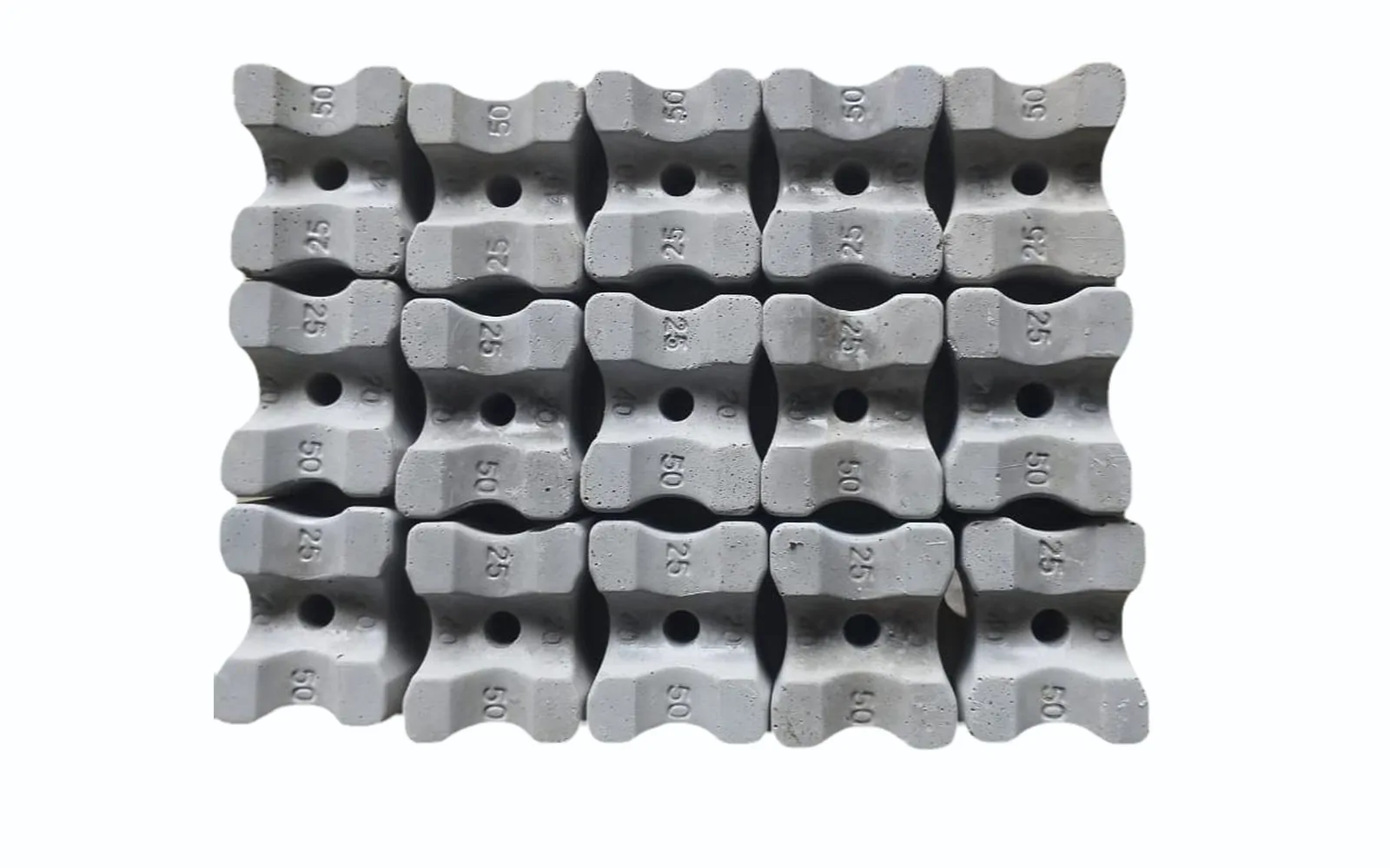 Concrete cover blocks with 20, 25 and 40 mm cover marked on the side