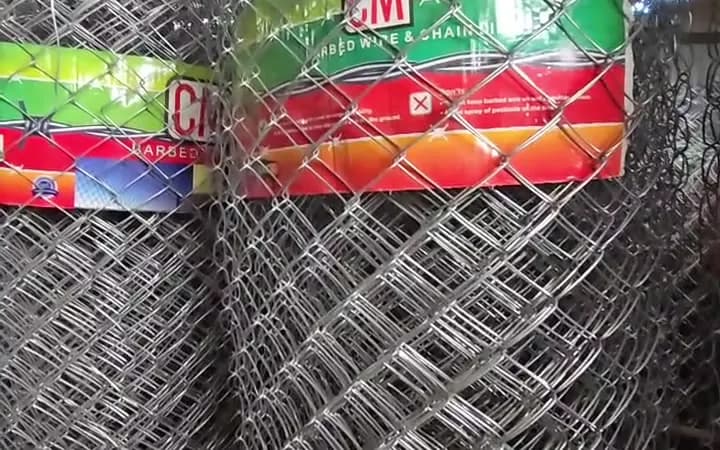 CM chain link fencing rolls with barbed wire labels