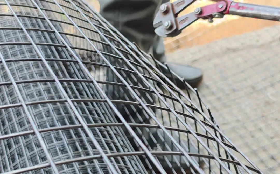 Cutting welded wire mesh with bolt cutters