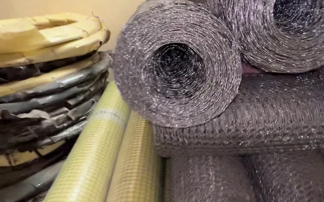Hexagonal wire netting rolls stacked in stock