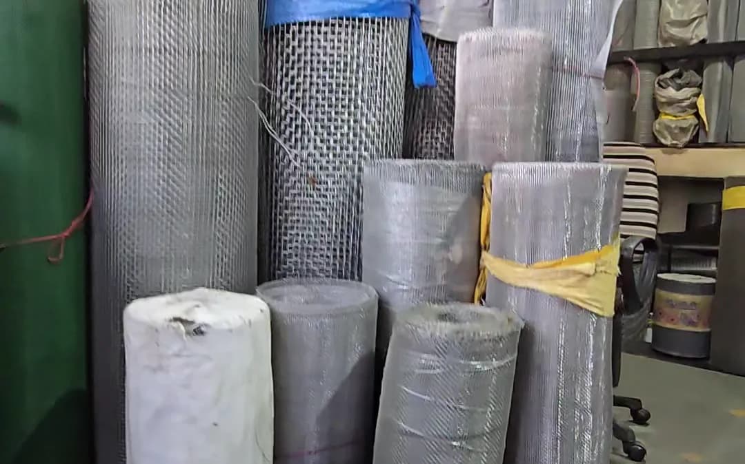 Rolls of steel and fibreglass mosquito net of different widths