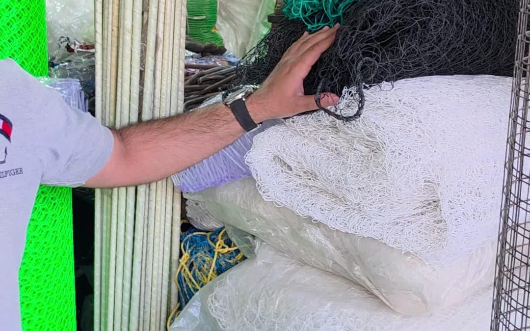 Pigeon net being handled at the shop
