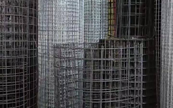 Welded wire mesh rolls standing in the stock room