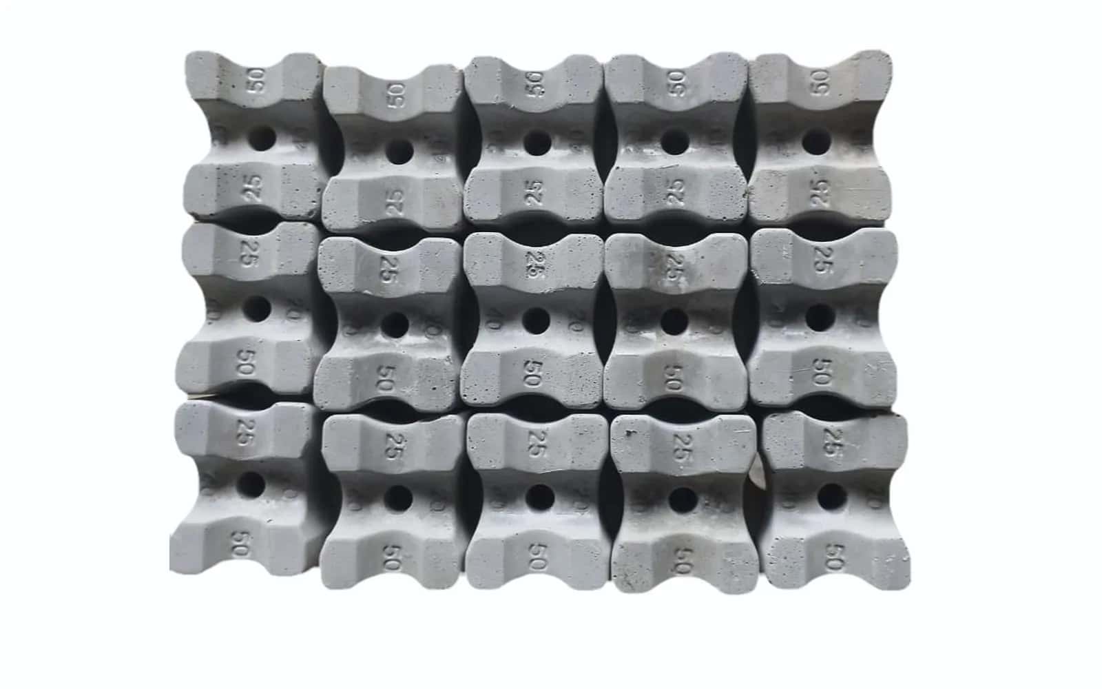 Concrete cover blocks with 20, 25 and 40 mm cover marked on the side