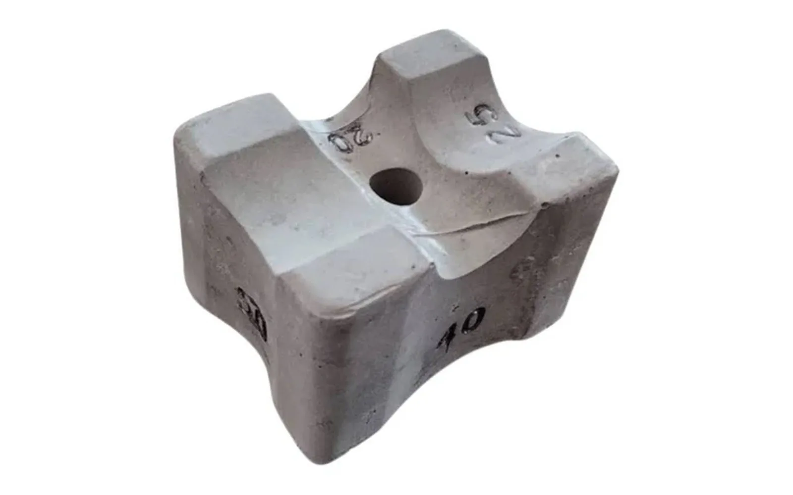 Cement cover block, side view