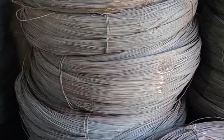 Large coil of black wire up close