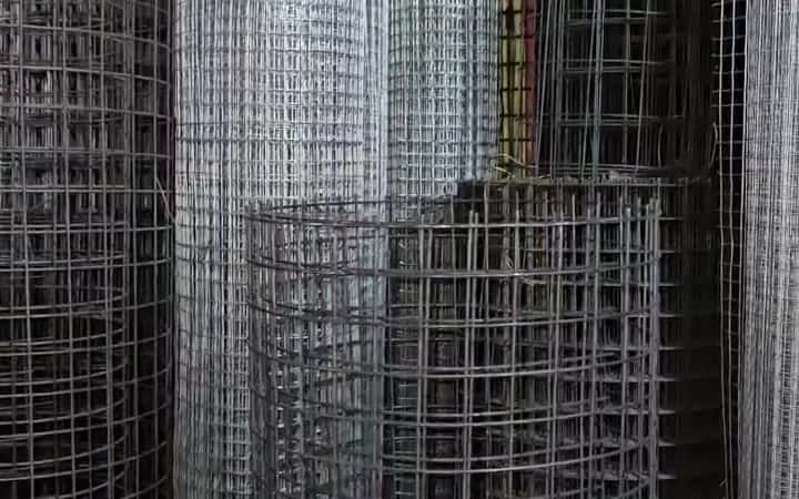 Welded wire mesh rolls standing in the stock room