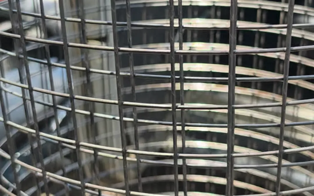 Welded mesh in a rolled cylinder, close view